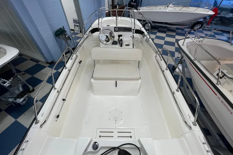 Slide: The Image of Interior view of the 2026 Boston Whaler 170 Montauk boat. - 14