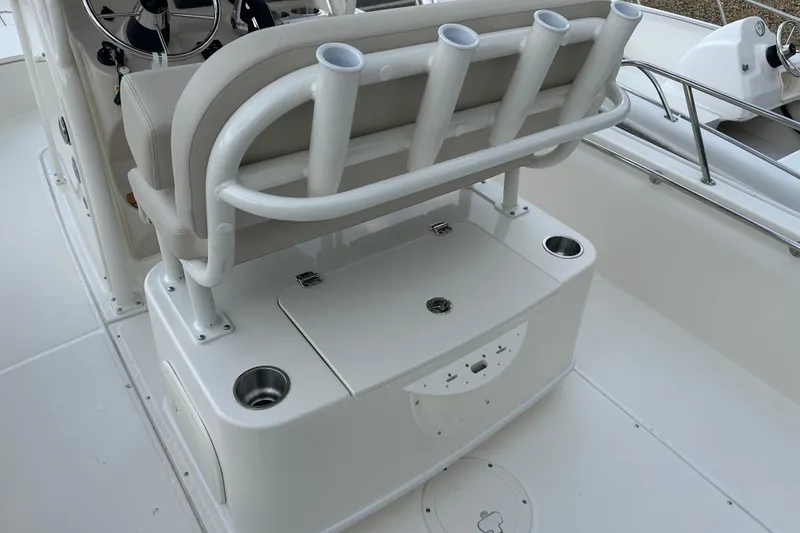 Slide: The Image of Interior of 2025 Boston Whaler 210 Montauk with bench seat and cup holders. - 5