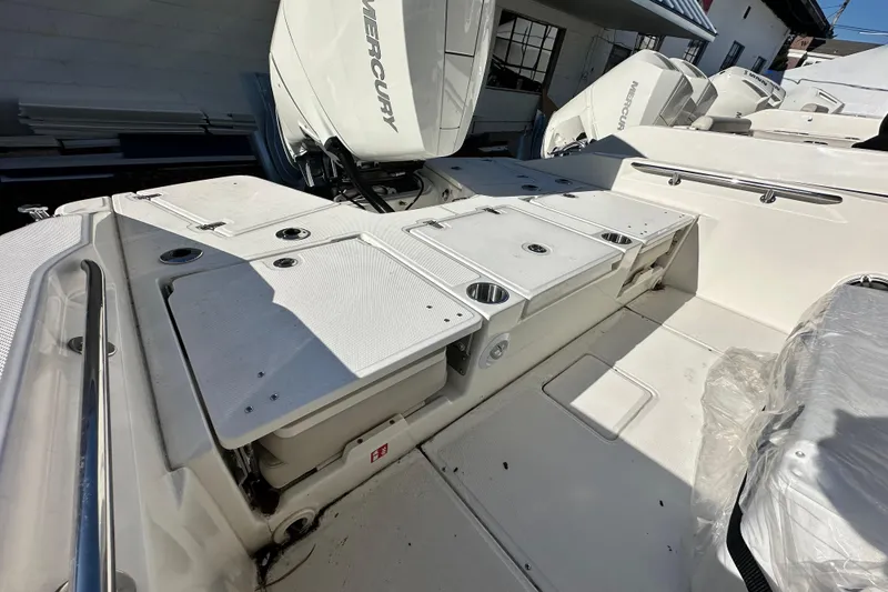 Slide: The Image of Interior view of 2026 Boston Whaler 250 Dauntless with Mercury engines. - 11
