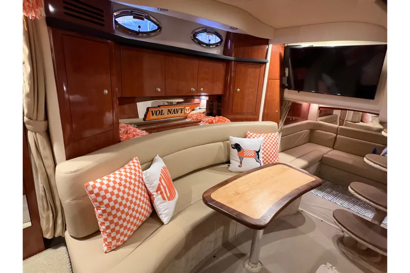 Slide: The Image of Luxurious 2007 Sea Ray 340 Sundancer interior with plush seating and stylish decor. - 16