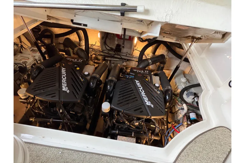 Slide: The Image of Engine compartment of a 2007 Sea Ray 340 Sundancer with twin Mercury engines. - 20
