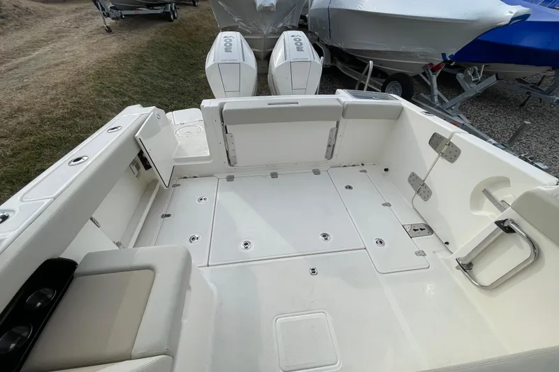 Slide: The Image of Interior of 2026 Boston Whaler 280 Vantage with dual engines. - 28