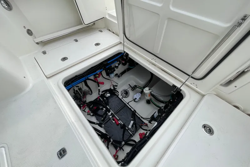 Slide: The Image of Interior view of 2026 Boston Whaler 280 Vantage engine compartment. - 30