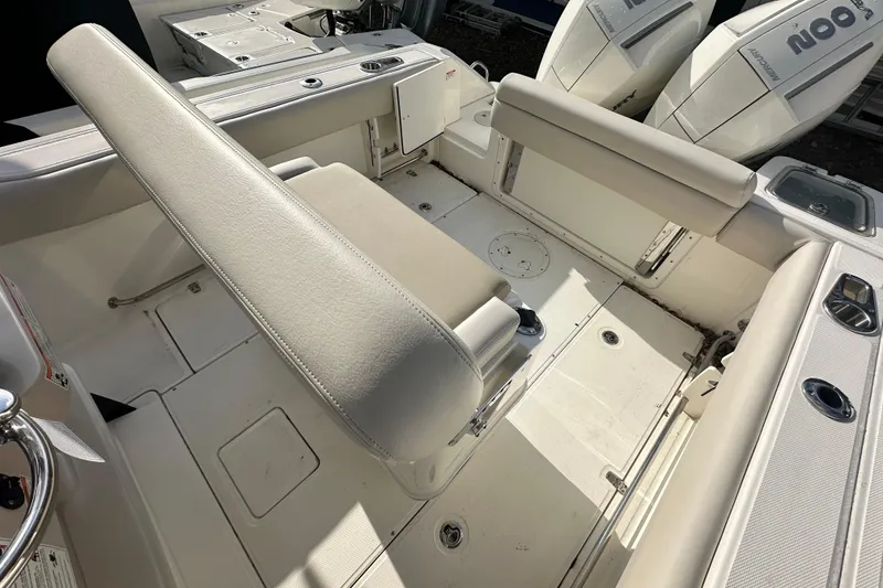 Slide: The Image of Interior of 2026 Boston Whaler 230 Outrage with seating area. - 21