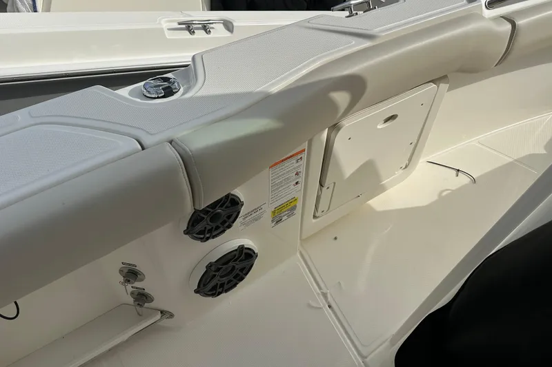 Slide: The Image of Interior view of 2025 Boston Whaler 250 Outrage with speakers. - 10