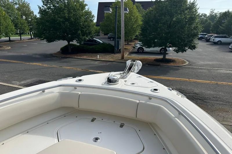 Slide: The Image of Bow of a 2025 Boston Whaler 250 Outrage boat outdoors. - 5