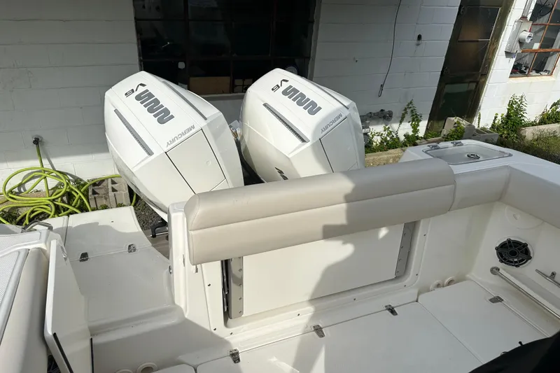 Slide: The Image of Boston Whaler 250 Outrage 2025 with dual Mercury engines. - 8