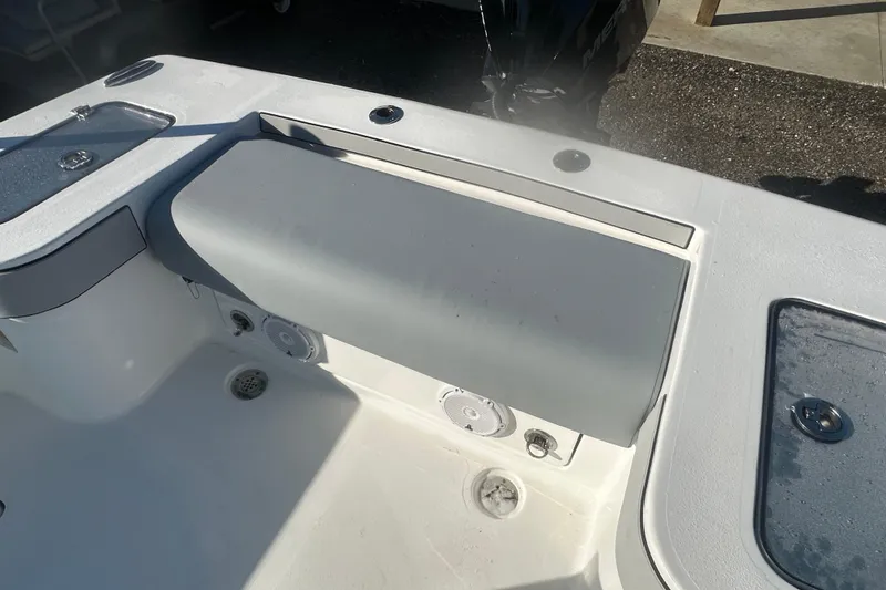 Slide: The Image of 2026 Delta Boatworks Delta D245 interior with seating and storage compartments. - 18