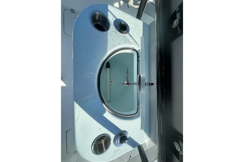 Slide: The Image of 2026 Delta Boatworks Delta D245 sink with cup holders and faucet. - 24