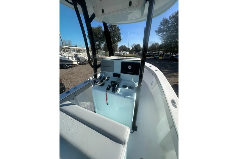 Slide: The Image of 2026 Delta Boatworks Delta D245 cockpit with Garmin navigation, sleek design, and modern controls. - 25