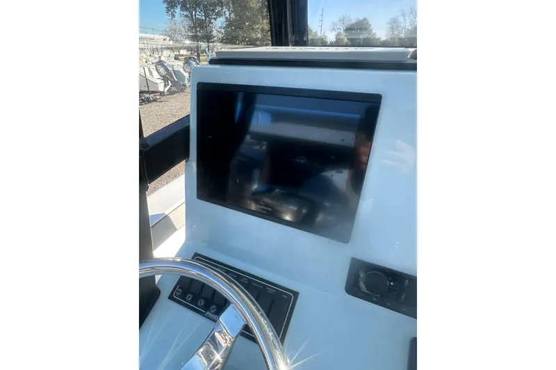 Slide: The Image of Helm of 2026 Delta Boatworks Delta D245 with modern navigation display. - 28