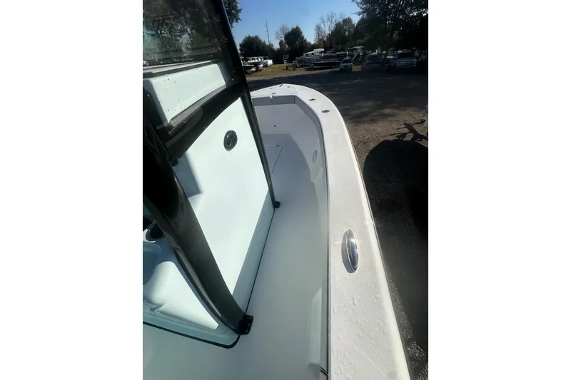 Slide: The Image of 2026 Delta Boatworks Delta D245, sleek white deck, outdoor setting. - 32