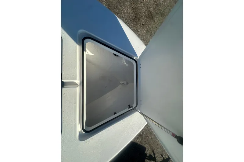 Slide: The Image of Open storage compartment on 2026 Delta Boatworks Delta D245 boat. - 35