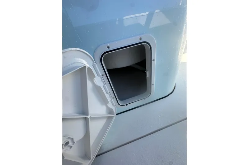 Slide: The Image of Open storage compartment on 2026 Delta Boatworks Delta D245 boat. - 40