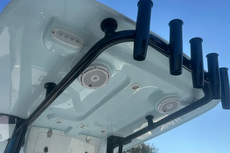 Slide: The Image of 2026 Delta Boatworks Delta D245 T-top with rod holders and speakers. - 41