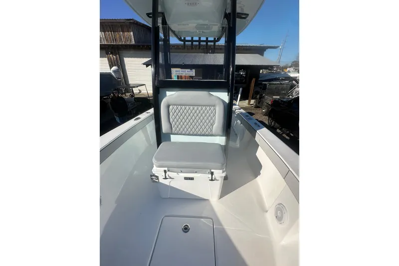 Slide: The Image of 2026 Delta Boatworks Delta D245 interior with cushioned seating and storage. - 43