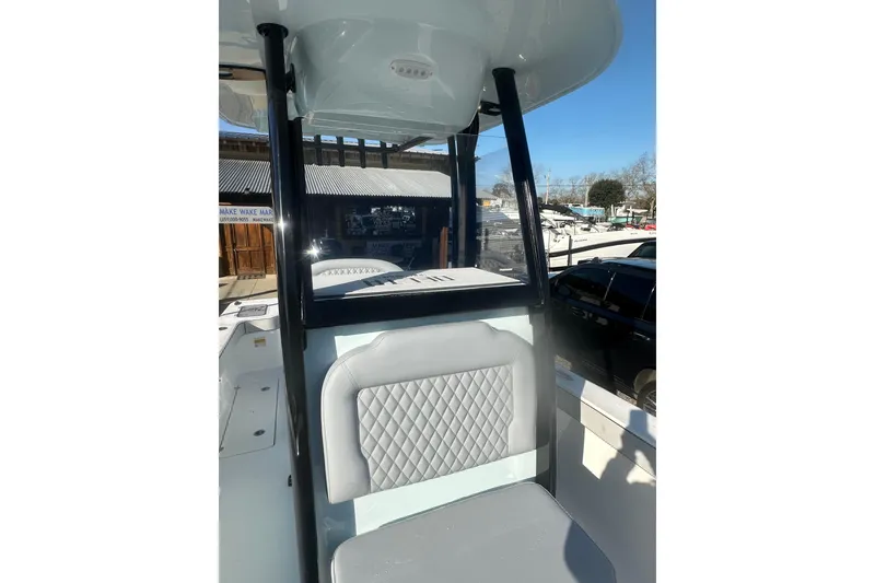 Slide: The Image of 2026 Delta Boatworks Delta D245 interior with cushioned seating and modern design. - 44