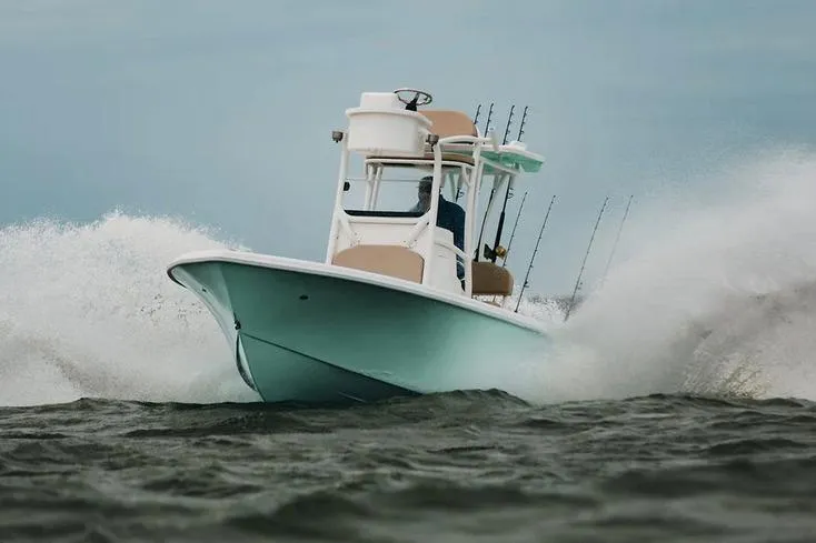 Slide: The Image of Manufacturer Provided Image: Delta Boatworks Delta D245, 2026 model, navigating through waves at high speed. - 49
