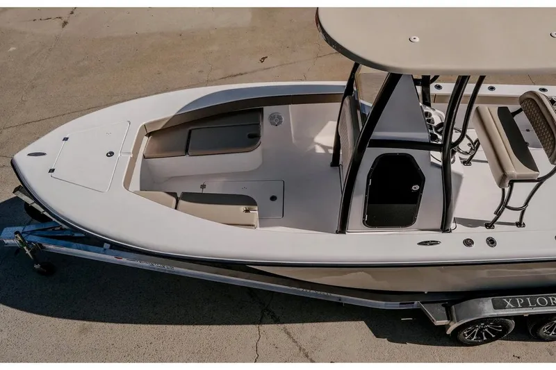 Slide: The Image of Manufacturer Provided Image: 2026 Delta Boatworks Delta D245 on trailer, top view, showcasing sleek design and spacious deck. - 51