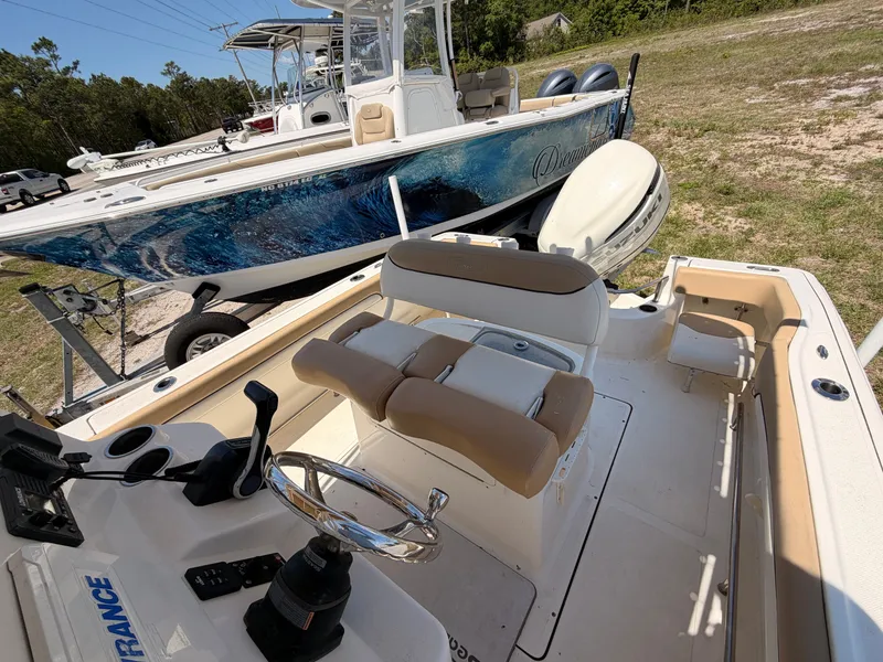 Slide: The Image of Interior view of a 2019 Pioneer 222 Sportfish boat. - 22
