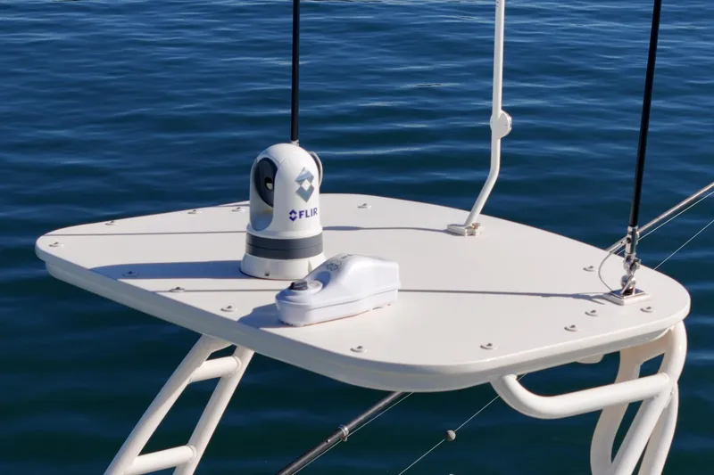 Slide: The Image of 2023 Scout 530 LXF boat with FLIR camera on deck, ocean background. - 34