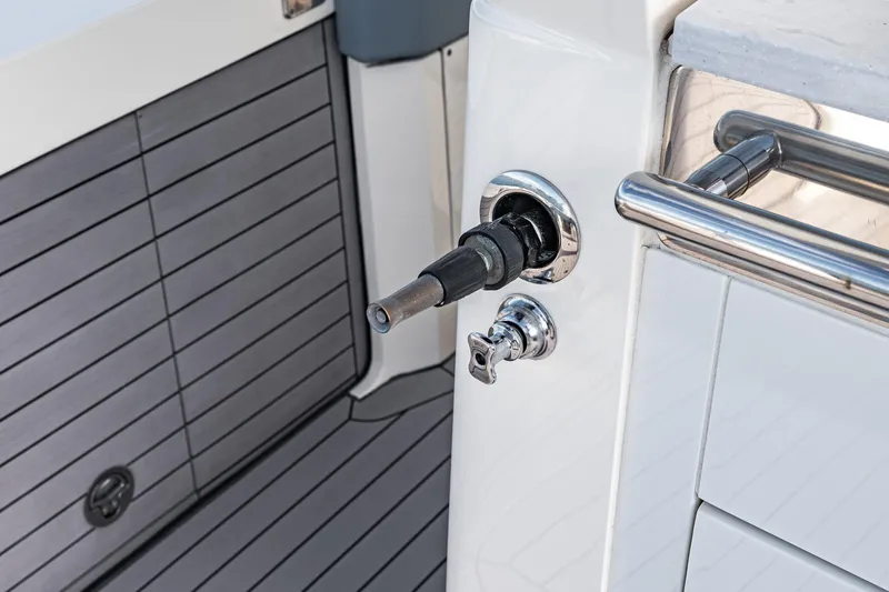 Slide: The Image of 2023 Scout 530 LXF boat detail with stainless steel fittings and deck. - 51