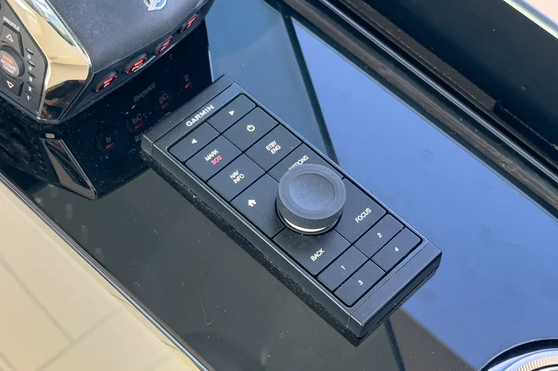 Slide: The Image of Garmin control panel on 2023 Scout 530 LXF boat dashboard. - 58