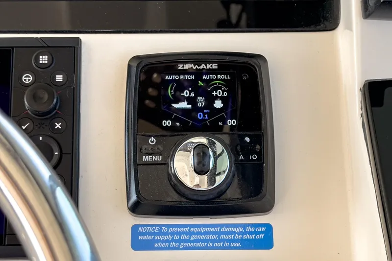 Slide: The Image of 2023 Scout 530 LXF boat control panel with Zipwake auto pitch and roll system. - 60