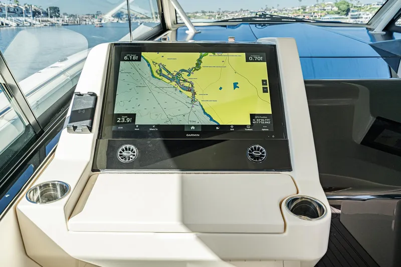 Slide: The Image of 2023 Scout 530 LXF boat with Garmin navigation display showing nautical map. - 64