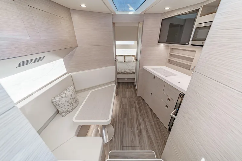 Slide: The Image of Luxurious interior of 2023 Scout 530 LXF yacht with modern kitchen and seating area. - 66
