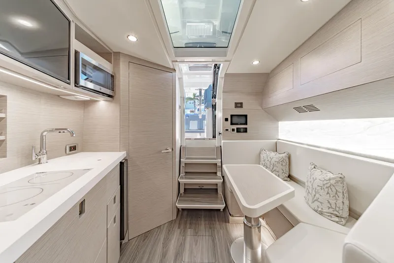 Slide: The Image of Luxurious interior of 2023 Scout 530 LXF yacht with modern kitchen and seating area. - 67