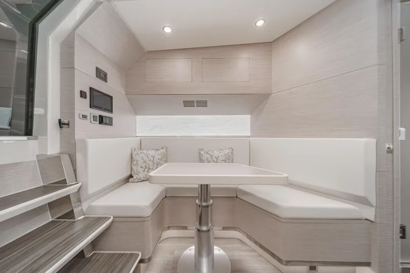 Slide: The Image of Luxurious interior of 2023 Scout 530 LXF yacht with modern seating and table. - 68