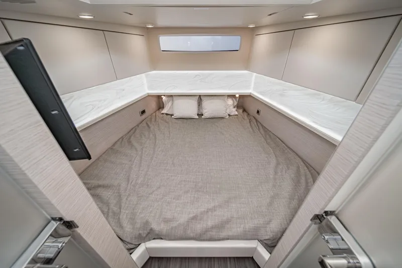 Slide: The Image of 2023 Scout 530 LXF cabin interior with cozy bed and modern design. - 72