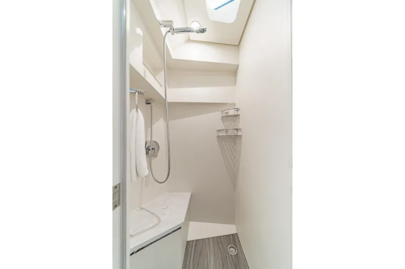 Slide: The Image of 2023 Scout 530 LXF yacht shower with modern fixtures and sleek design. - 75