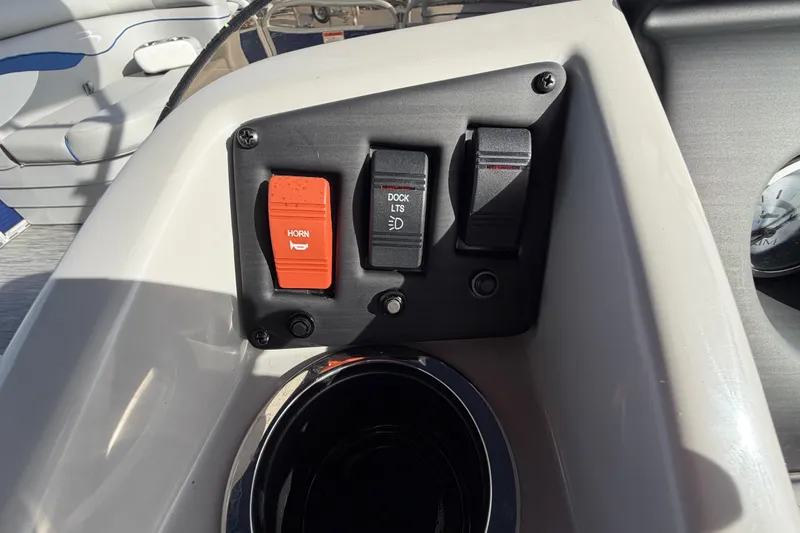 Slide: The Image of Control panel of a 2021 Bennington 20 SV boat with horn and light switches. - 26