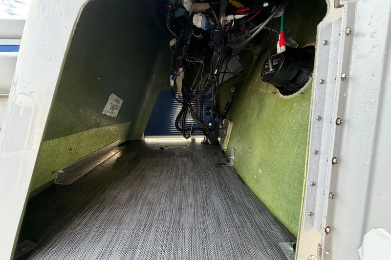 Slide: The Image of Interior view of a 2021 Bennington 20 SV boat showing wiring and components. - 31