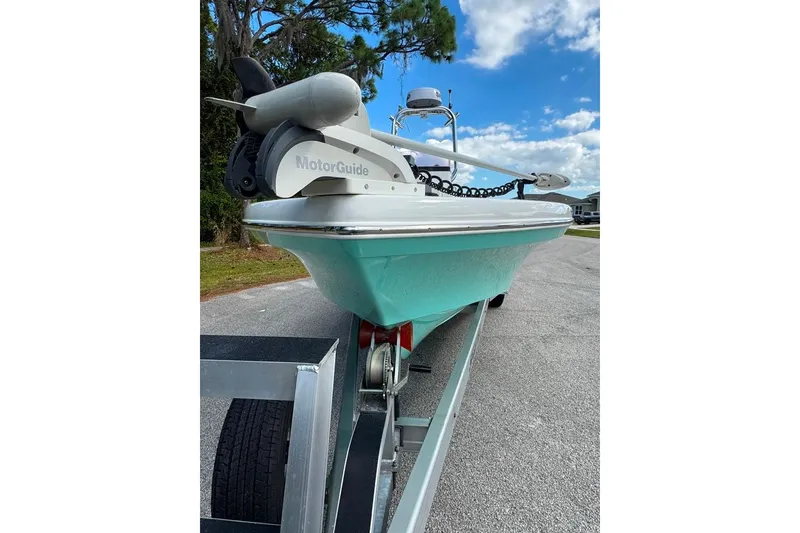 Slide: The Image of 2021 BlackJack 256 Coastal boat on trailer with MotorGuide trolling motor. - 12