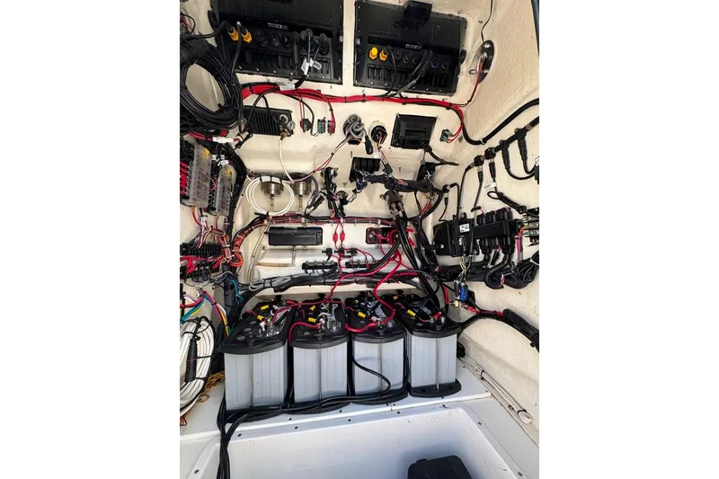 Slide: The Image of Electrical system of 2021 BlackJack 256 Coastal boat with batteries and wiring. - 17