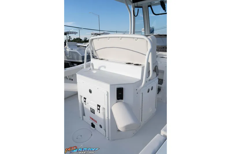 Slide: The Image of 2026 Sea Hunt Ultra 265 SE boat interior with seating and storage. - 22