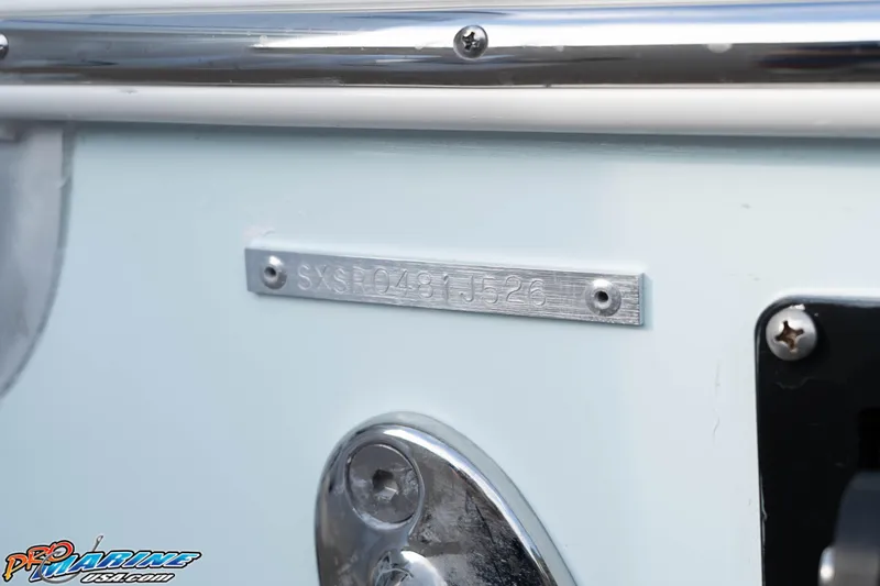 Slide: The Image of 2026 Sea Hunt Ultra 265 SE boat identification plate and hardware detail. - 4