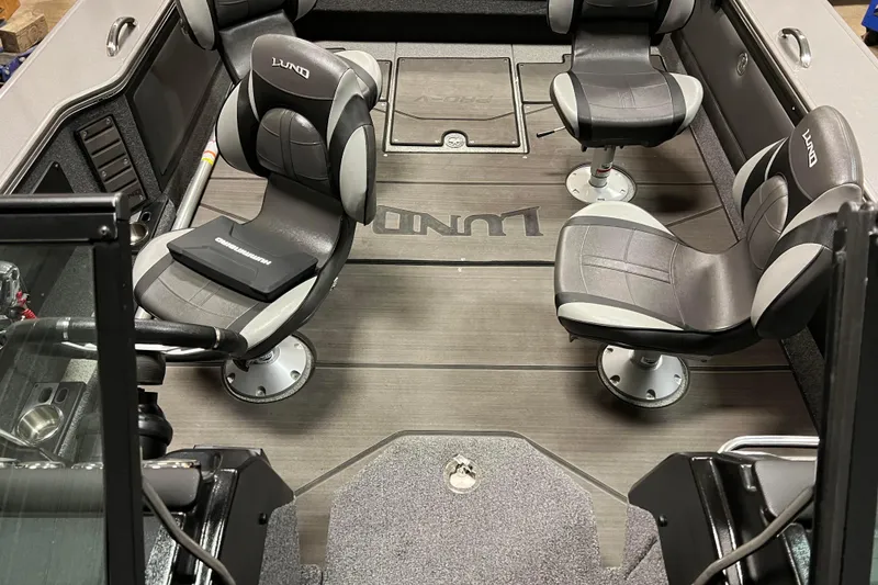 Slide: The Image of Interior of 2023 Lund 2175 Pro-V boat with four swivel seats. - 24