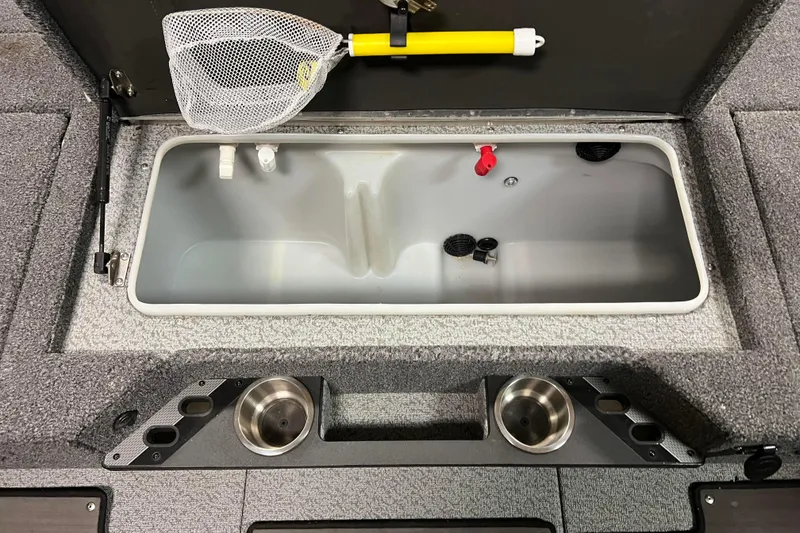 Slide: The Image of 2023 Lund 2175 Pro-V boat livewell with net and cup holders. - 31