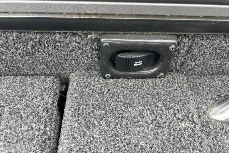 Slide: The Image of Carpeted interior of 2023 Lund 2175 Pro-V with washdown switch. - 70