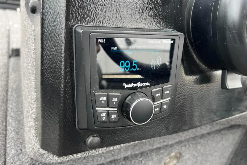 Slide: The Image of 2023 Lund 2175 Pro-V boat dashboard with Rockford Fosgate radio display. - 73