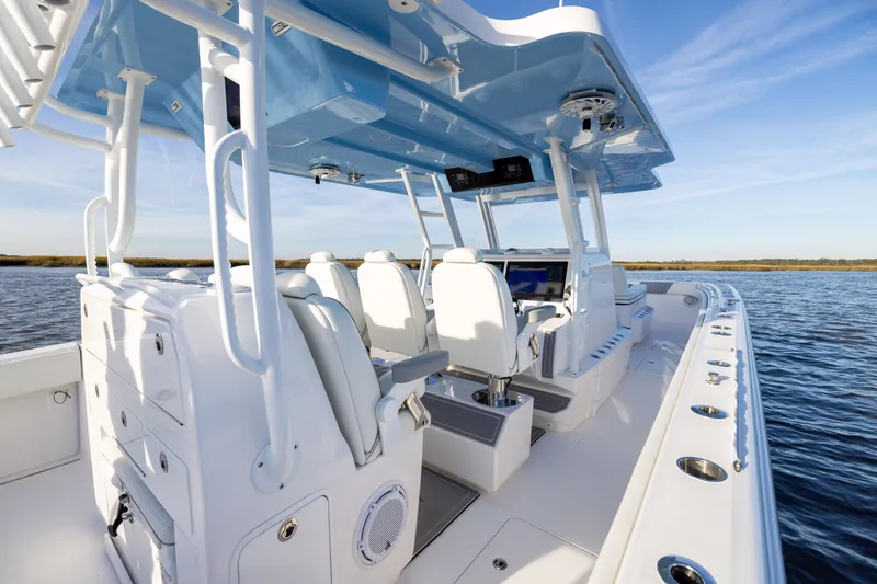 Slide: The Image of 2024 Invincible 40 Catamaran interior with sleek design and advanced navigation system. - 28