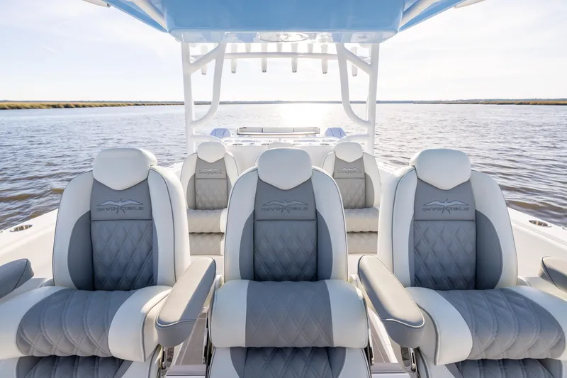 Slide: The Image of Luxurious seating on 2024 Invincible 40 Catamaran, featuring elegant design and waterfront view. - 36