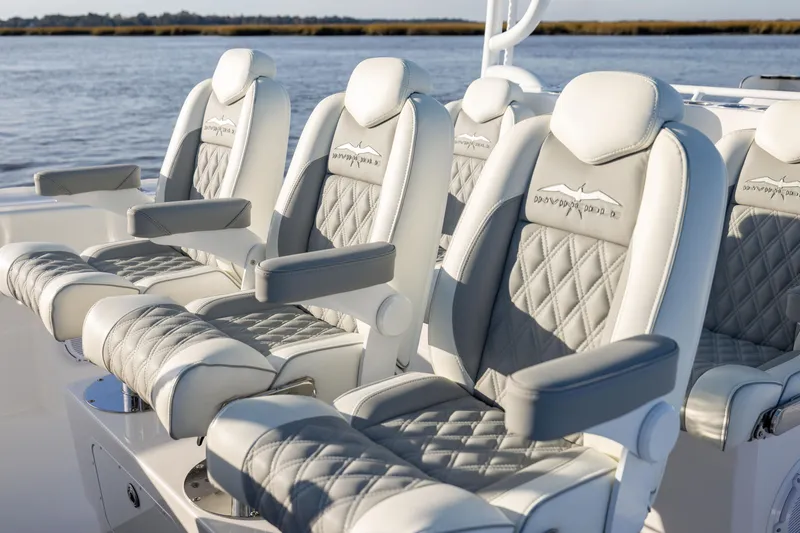 Slide: The Image of Luxurious seating on 2024 Invincible 40 Catamaran, featuring elegant diamond-stitched upholstery. - 40