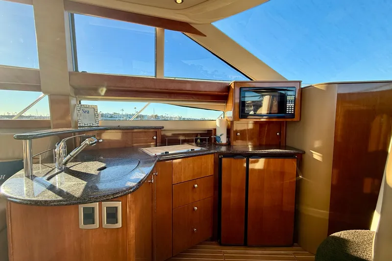 Slide: The Image of Luxurious 2006 Meridian 391 Sedan yacht interior with modern kitchen amenities. - 18