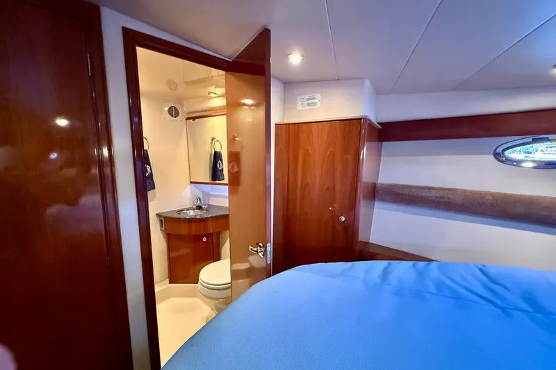 Slide: The Image of Interior of 2006 Meridian 391 Sedan yacht showing bedroom and bathroom. - 28