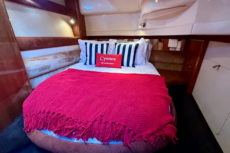 Slide: The Image of Luxurious cabin interior of 2006 Meridian 391 Sedan with cozy bed and vibrant decor. - 30